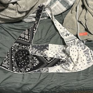 Super cute top to either go out in or wear over your swim suit